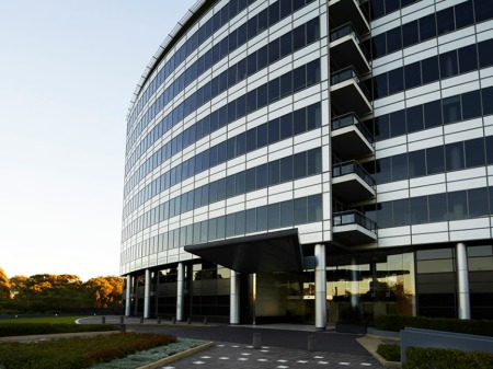 Entrance of the 123 Epping Road building at dusk